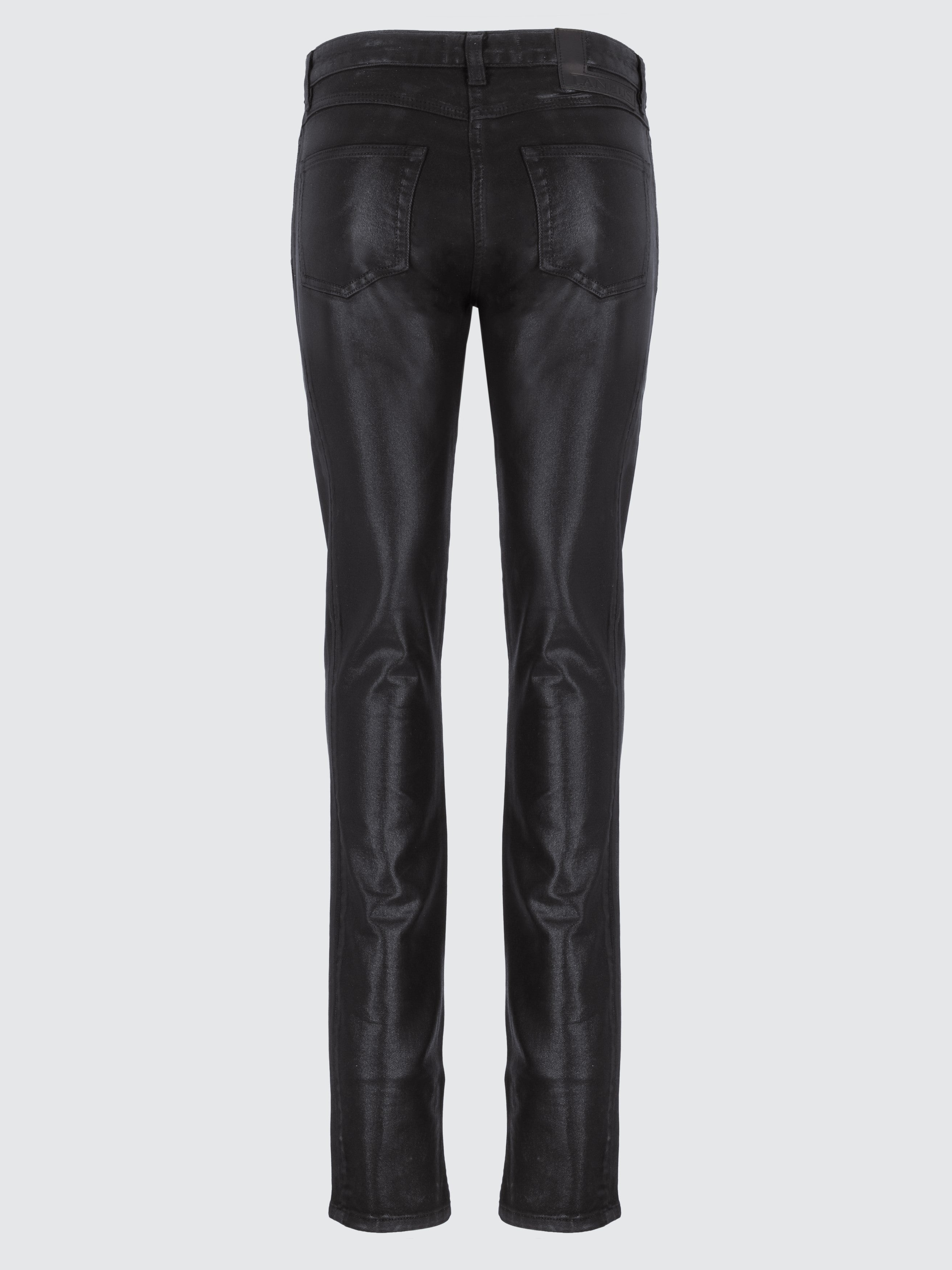 Jeans spalmati effetto pelle
