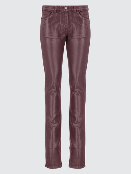 Jeans spalmati effetto pelle