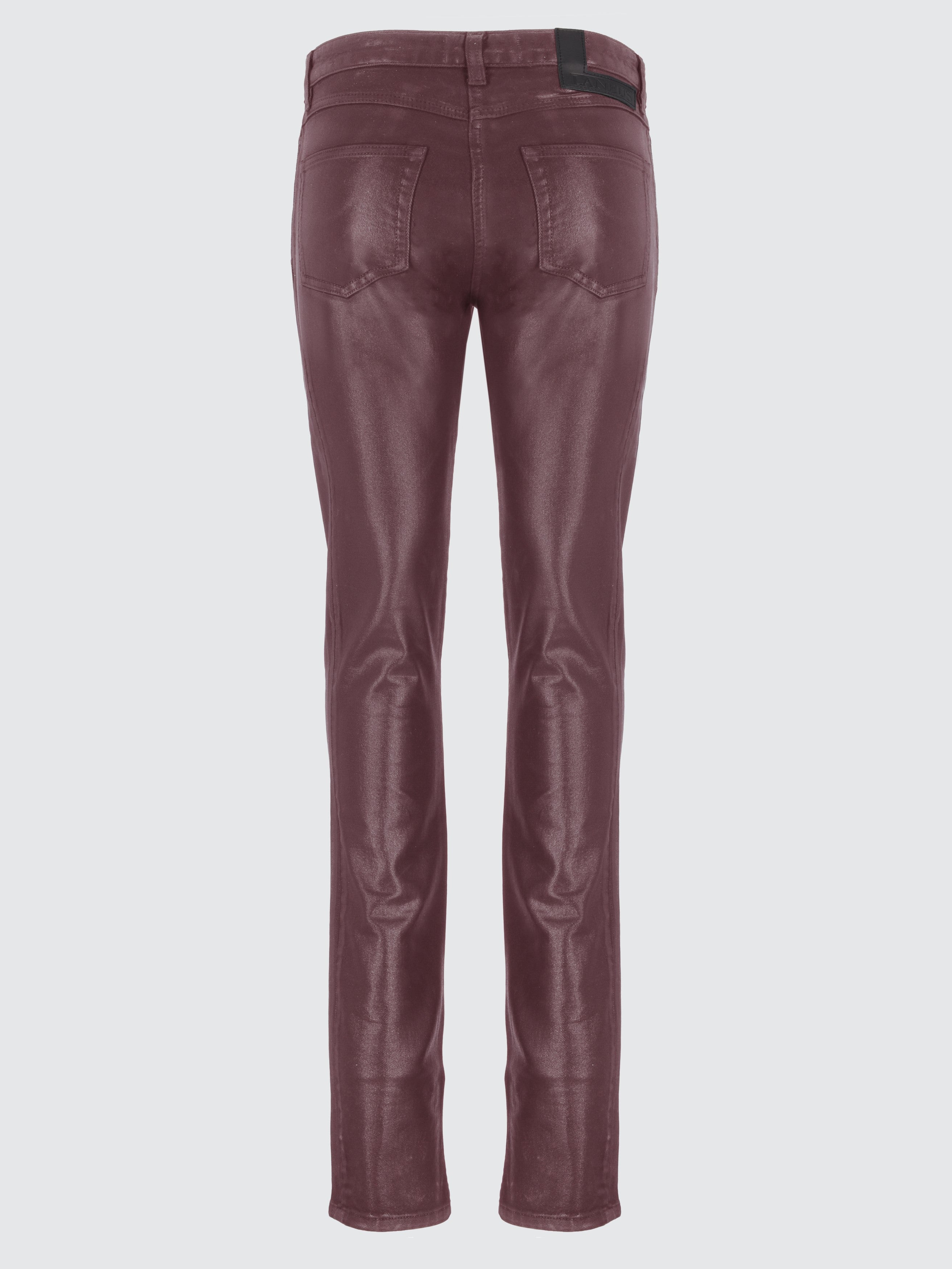 Jeans spalmati effetto pelle