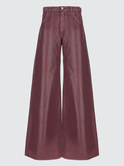 Jeans baggy spalmati effetto pelle